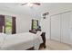 Comfortable bedroom featuring a ceiling fan, closet, and a TV mount at 157 Olde Towne Way # 4, Myrtle Beach, SC 29588