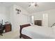 Bedroom with matching furniture and ceiling fan at 157 Olde Towne Way # 4, Myrtle Beach, SC 29588