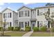 Charming townhome with gray siding, black shutters, and manicured landscaping at 157 Olde Towne Way # 4, Myrtle Beach, SC 29588