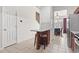 Eat-in kitchen boasts additional island seating and access to dining room at 157 Olde Towne Way # 4, Myrtle Beach, SC 29588