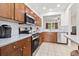 This kitchen features stainless steel appliances and wood cabinetry at 157 Olde Towne Way # 4, Myrtle Beach, SC 29588