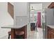 View from eat-in kitchen into dining room, featuring stainless appliances at 157 Olde Towne Way # 4, Myrtle Beach, SC 29588