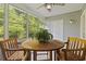Enclosed patio area with ceiling fan, ample light, and outdoor access at 157 Olde Towne Way # 4, Myrtle Beach, SC 29588