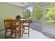 Enclosed patio area featuring ample seating and views of nature at 157 Olde Towne Way # 4, Myrtle Beach, SC 29588