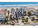 Aerial view of a coastal property showcasing proximity to the beach and ocean views at 1611A S Ocean Blvd., Surfside Beach, SC 29575