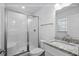 Modern bathroom with glass shower, granite vanity, and neutral paint to give it a clean look at 1611A S Ocean Blvd., Surfside Beach, SC 29575
