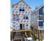 New home construction is shown with direct beach access on an elevated foundation at 1611A S Ocean Blvd., Surfside Beach, SC 29575