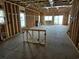 Under construction home showcasing open floorplan living area with sliding glass doors at 1611A S Ocean Blvd., Surfside Beach, SC 29575