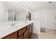 Bathroom with double sink vanity, tile floor, and white walls at 189 Sea Turtle Dr., Myrtle Beach, SC 29588