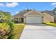 Charming single-Gathering home featuring a two-car garage and well-maintained lawn at 189 Sea Turtle Dr., Myrtle Beach, SC 29588