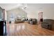 Open living room with vaulted ceilings and wood laminate flooring at 189 Sea Turtle Dr., Myrtle Beach, SC 29588