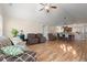 Open-concept living area with vaulted ceiling, wood floor and view of the dining area and kitchen at 189 Sea Turtle Dr., Myrtle Beach, SC 29588