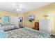 A vibrant bedroom featuring two beds, bright colors, and an open layout for a cozy stay at 200 53Rd Ave. N # 409, North Myrtle Beach, SC 29582