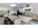 Spacious kitchen with granite counters, stainless steel appliances, and bar seating at 200 53Rd Ave. N # 409, North Myrtle Beach, SC 29582