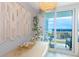 Bright dining area with natural light, coastal decor, and access to a private balcony with ocean views at 200 76Th Ave. N # 408, Myrtle Beach, SC 29572