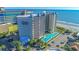 Coastal condo featuring a pool and ocean views, close to the beach at 200 76Th Ave. N # 408, Myrtle Beach, SC 29572