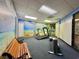 Well-equipped fitness room with a treadmill, stationary bike, and ample space for workouts at 200 76Th Ave. N # 408, Myrtle Beach, SC 29572