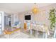 Stylishly decorated living room with TV, table, and comfortable seating at 200 76Th Ave. N # 408, Myrtle Beach, SC 29572