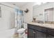 Bathroom vanity with granite countertop and adjacent bathtub and toilet at 210 Fox Hunt Pl., Aynor, SC 29511