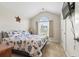 Nautical themed bedroom with a vaulted ceiling and a large window at 210 Fox Hunt Pl., Aynor, SC 29511