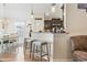 Bright kitchen with bar seating, granite countertops, and pendant lighting at 210 Fox Hunt Pl., Aynor, SC 29511