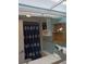 Inviting bathroom with a bathtub, storage shelves, and stylish decor for a comfortable and relaxing experience at 2207 S Ocean Blvd. # 1407, Myrtle Beach, SC 29577