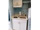 Efficient kitchenette equipped with appliances, sink, and storage, ideal for convenient meal preparation at 2207 S Ocean Blvd. # 1407, Myrtle Beach, SC 29577