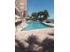 Take a dip in the sparkling outdoor pool, surrounded by palm trees and lounge chairs at 2207 S Ocean Blvd. # 1407, Myrtle Beach, SC 29577