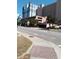Street view of the hotel with tropical landscaping and garage entrance, highlighting its coastal location at 2207 S Ocean Blvd. # 1407, Myrtle Beach, SC 29577