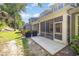 Backyard view of the screened porch, patio and lush landscaping at 2409 Thoroughfare Dr. # 2409, North Myrtle Beach, SC 29582