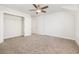 Spacious bedroom boasts ample closet space, plush carpeting, and white trim, offering comfort and style at 2409 Thoroughfare Dr. # 2409, North Myrtle Beach, SC 29582