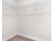 Walk in closet featuring a wire shelving system, neutral carpet, and white walls at 2409 Thoroughfare Dr. # 2409, North Myrtle Beach, SC 29582