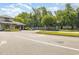 Community entrance featuring a gatehouse, landscaping, and neighborhood signage at 2409 Thoroughfare Dr. # 2409, North Myrtle Beach, SC 29582