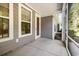 Covered porch featuring concrete flooring and access to the outside yard at 2409 Thoroughfare Dr. # 2409, North Myrtle Beach, SC 29582