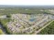 A picturesque aerial view showcasing the community's layout, ponds, landscaping, and cohesive home designs at 2825 Mcdougall Dr., Conway, SC 29526