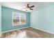 Bright, airy bedroom with ample natural light and wood-look floors at 2825 Mcdougall Dr., Conway, SC 29526