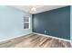 Comfortable bedroom with a large window and stylish wall paint at 2825 Mcdougall Dr., Conway, SC 29526