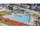 Aerial view of a community pool with lounge chairs and a white picket fence at 2825 Mcdougall Dr., Conway, SC 29526