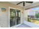 A cozy, screened-in porch featuring a sliding glass door for seamless indoor-outdoor living at 2825 Mcdougall Dr., Conway, SC 29526