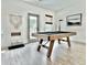 Finished game room with pool table, light wood floors and a door to the patio at 2858 Ellesmere Circle, Myrtle Beach, SC 29579