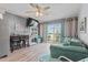 The living room features wood floors, modern furniture, and a slider to the outside balcony at 301 N Waccamaw Dr. # 110, Murrells Inlet, SC 29576