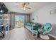 A well-lit living room features modern decor and a slider to the outside balcony at 301 N Waccamaw Dr. # 110, Murrells Inlet, SC 29576