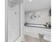 Bathroom with a glass-enclosed shower and a separate soaking tub for a spa-like experience at 3175 Lyndon Dr., Little River, SC 29566