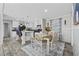 Dining room and kitchen area feature modern appliances, hardwood floors, and stylish decor at 3175 Lyndon Dr., Little River, SC 29566