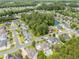 Neighborhood aerial view with mature trees, well maintained lawns, and a mix of home styles at 3564 Brampton Dr., Myrtle Beach, SC 29588