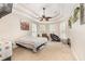 Spacious main bedroom with tray ceilings, plantation shutters, and sitting area offers a private retreat at 3564 Brampton Dr., Myrtle Beach, SC 29588