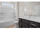 Clean bathroom with a combination tub and shower, a vanity, and a toilet at 367 Broughton Dr., Myrtle Beach, SC 29579