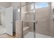 Modern bathroom featuring a spacious glass enclosed shower with tile surround and a built-in seat at 367 Broughton Dr., Myrtle Beach, SC 29579