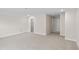 Spacious bedroom with neutral carpet, white trim, and multiple doors leading to various areas at 367 Broughton Dr., Myrtle Beach, SC 29579