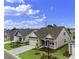 New homes in a neighborhood featuring well manicured lawns and landscaping and sidewalks at 367 Broughton Dr., Myrtle Beach, SC 29579